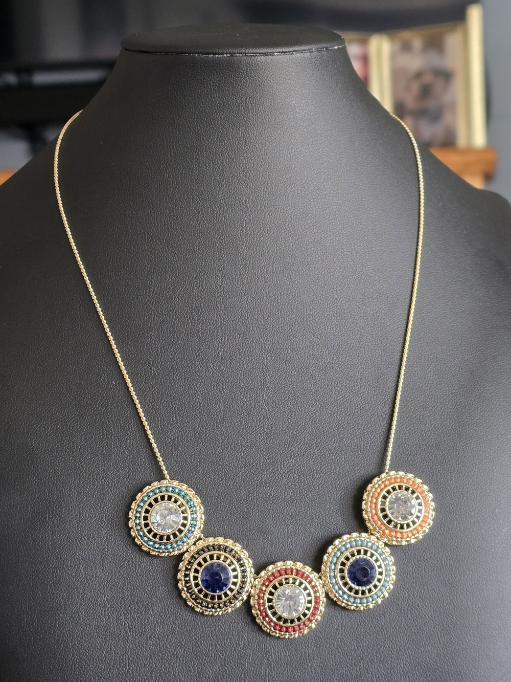Avon Gold-tone Multicolor Disc Necklace with Blue and Red Accents